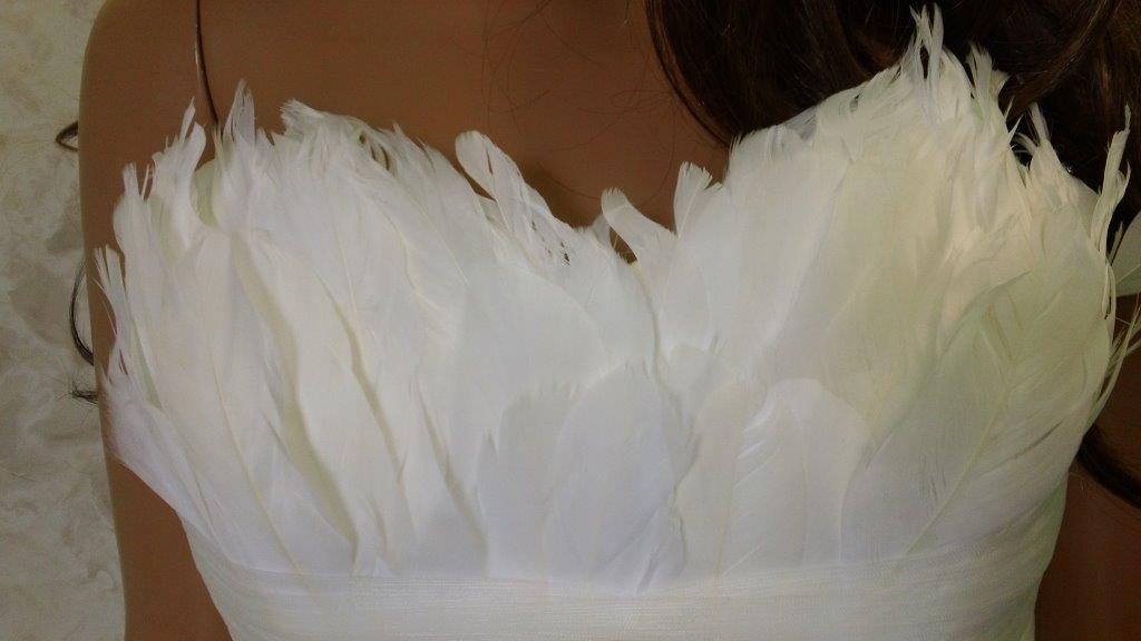 Wedding dress with 2025 feathers on bust